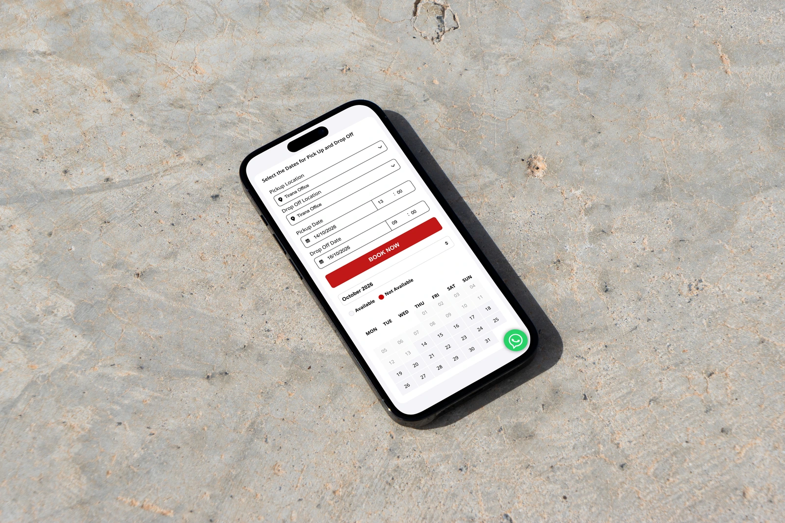 RentTech’s mobile rental controls and availability calendar displayed on a phone on a stone path.